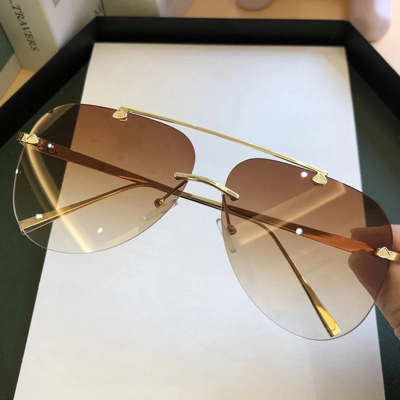 Vintage Fashion Enthusiasts - Klasyczne, bezramkowe okulary przeciwsłoneczne w stylu